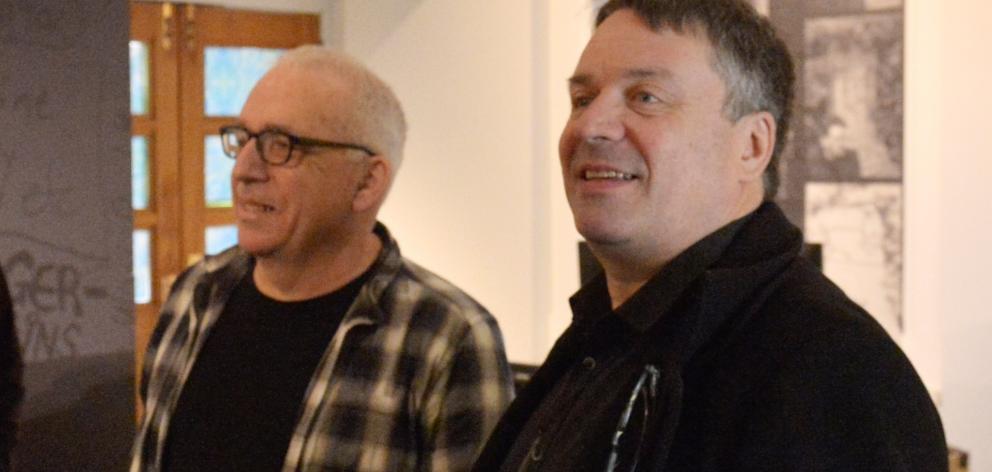 Chills exhibition curator Michael Findlay (left) listens  as the band’s leader, Martin Phillipps,...