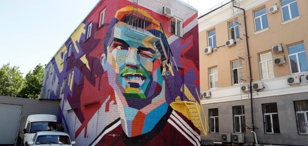 A mural of Portugal's Cristiano Ronaldo, painted in a courtyard in front of a hotel in Kazan, Russia. Photo: Reuters