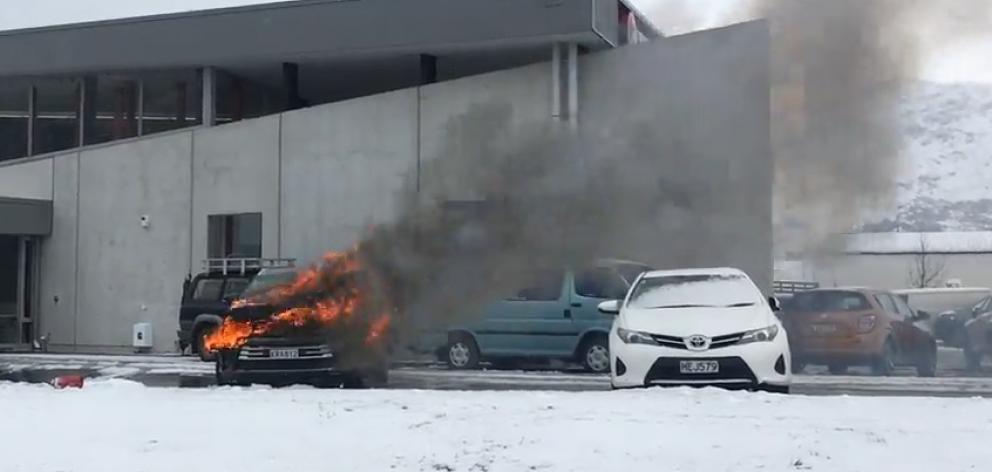A car caught fire at a dealership in Queenstown today. Photo: James Allan