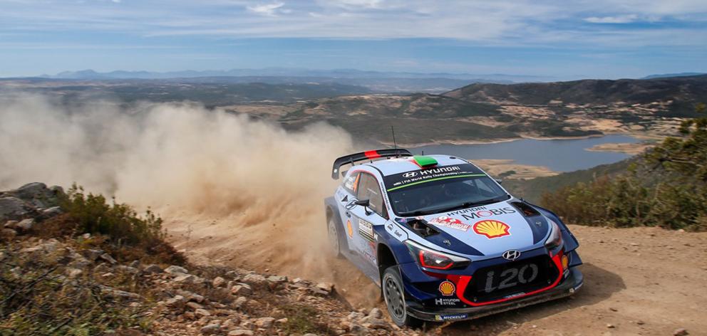 Hayden Paddon and co-driver Seb Marshall in their Hyundai i20 Coupe during Rally Sardinia in...