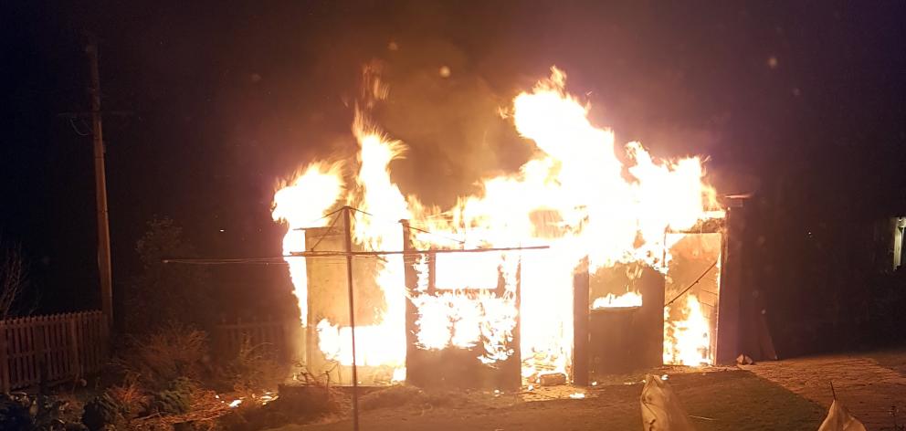 The garage shortly after emergency services were called about 12.30am yesterday.