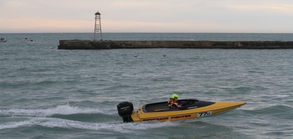 John Buckland and his co-pilot head back to Oamaru Harbour after the New Zealand Boat Marathon...