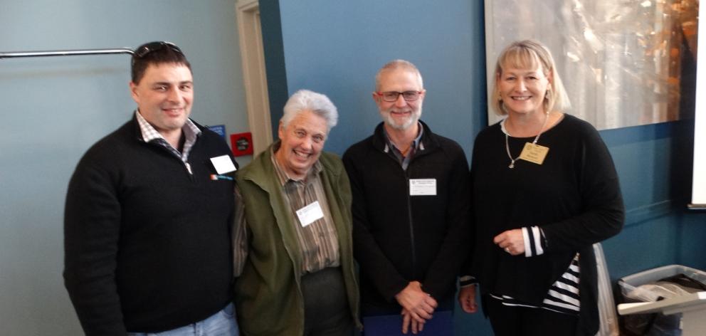 Rotary Club of Dunedin president Sarah Warhurst (right) congratulates Relay for Life stalwarts (from left) Tony McLellan, Isobel Burns, and Warren Chambers on being awarded Paul Harris Fellowships. Photo: Brenda Harwood