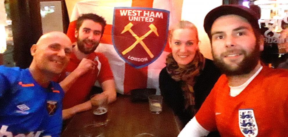 Waiting for England's quarterfinal against Sweden to start are (from left): Richard Eve, Bradley Eve, Suz Eve and Spencer Eve, at the Pig and Whistle Pub in Queenstown. Photo: Supplied