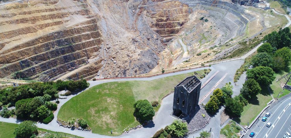 The historic Martha pit next to Waihi township, and the landslip which closed the pit operations...