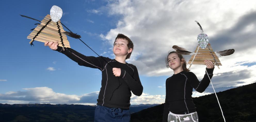 George (9, left) and Meisha Romeril (8) try out their kites at a Manu Tukutuku workshop, held as...