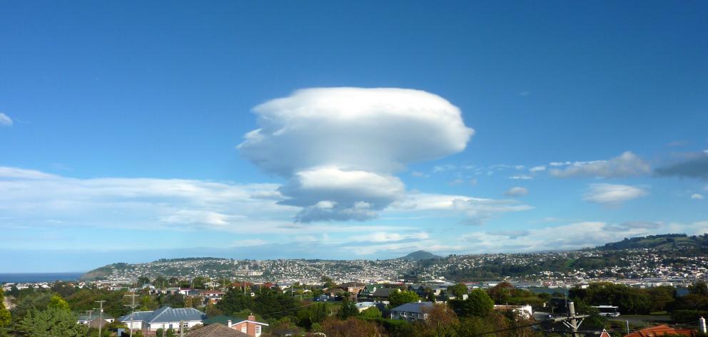 A lonely lenticular hovering beyond Saddle Hill at 10.46am on April 28, 2017, taken from the...