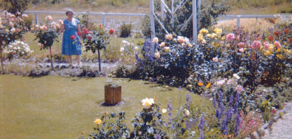Olive West in her garden in Ardmore St, opposite the lake shore. Photo: Supplied