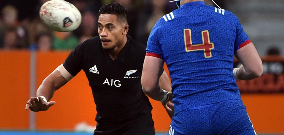 All Black loose forward Shannon Frizell looks towards the action along with French lock Bernard le Roux at Forsyth Barr Stadium last weekend. Photo: Peter McIntosh
