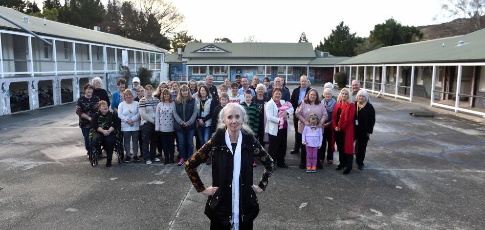 Stand chief executive Fiona Inkpen in front of a crowd of visitors and staff in the main...