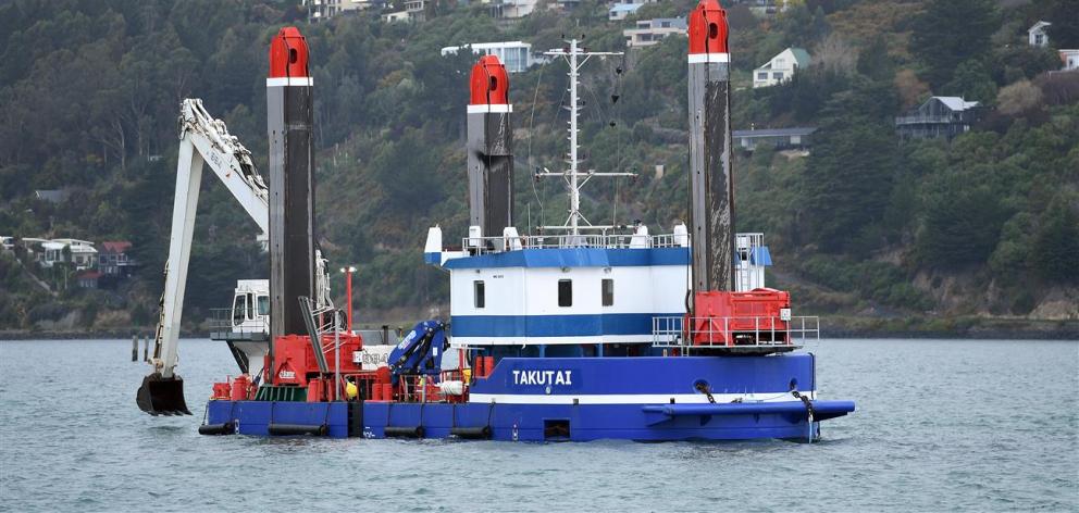 New dredge Takutai takes a short cruise on Otago Harbour for training yesterday. PHOTO: STEPHEN...