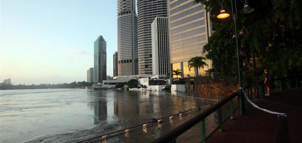The riverside walkways on the fringe of Brisbane's central business district were awash yesterday...