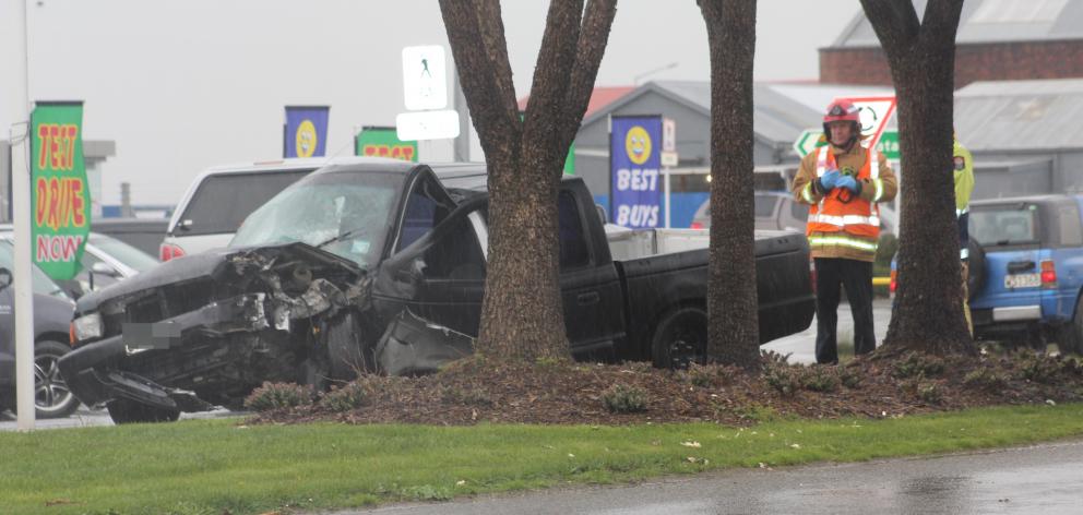 A ute stopped next to a tree after a crash in Invercargill this afternoon. Photo: Sharon Reece