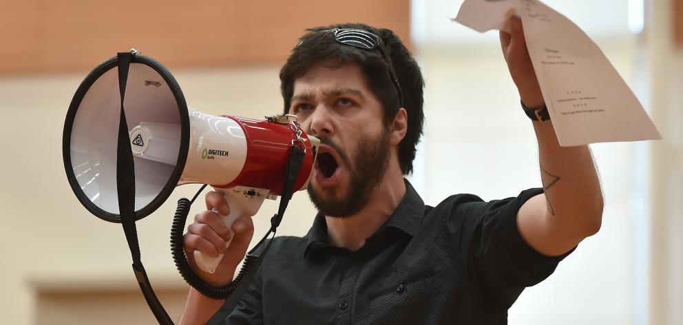 Opoho School teacher Sandor Toth leads the chant at a strike rally at the Edgar Centre in Dunedin yesterday morning. Photo: Gregor Richardson