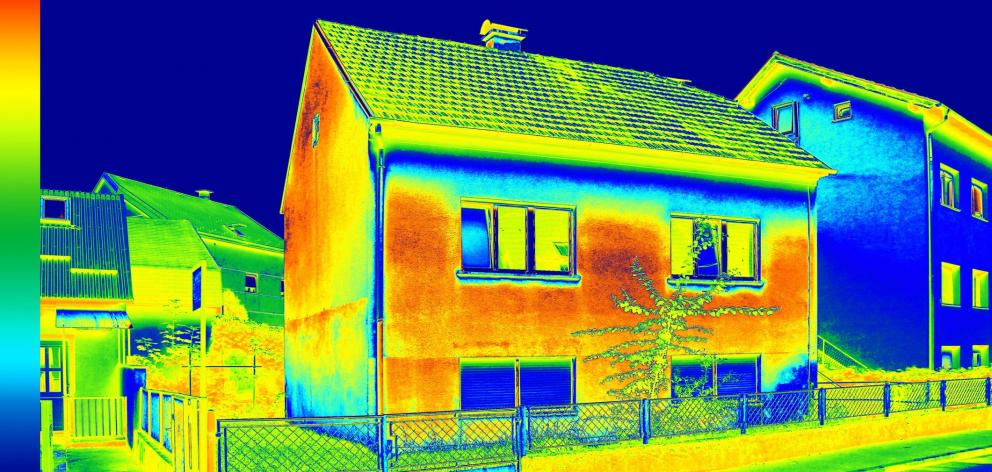 An infrared  image of a house shows its lack of thermal insulation. Photo: Getty Images