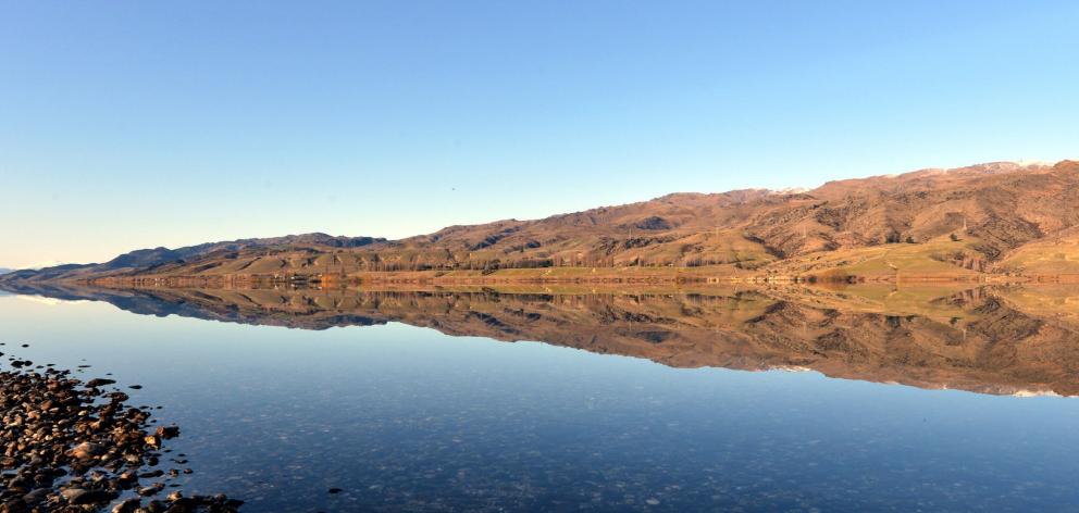 Lake Dunstan, formed after completion of the Clyde dam, owned by Contact Energy. The lake began filling in 1992. Photo: Stephen Jaquiery