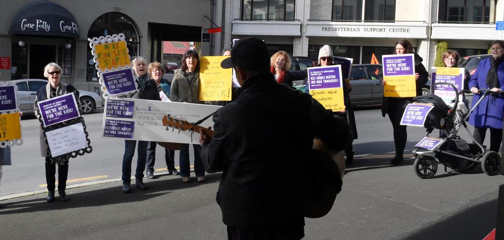 Dunedin learning support specialists rally outside the Ministry of Education offices in Moray Pl as part of yesterday's NZEI strike action. Photo: Stephen Jaquiery