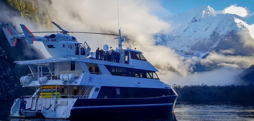The Heli Glenorchy chopper arrives to pick up passengers. PHOTO: FIONA FARQUHAR