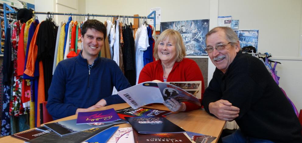 Taieri Musical Society members (from left) vice-president Blair Hughson, Ovation show director Helen Horsnell and committee member Bruce McDowell browse over programmes from past shows at they look forward to the society’s 50th anniversary celebrations in Taieri Musical Society members (from left) vice-president Blair Hughson, Ovation show director Helen Horsnell and committee member Bruce McDowell browse over programmes from past shows at they look forward to the society’s 50th anniversary celebrations in