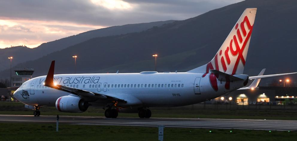 Many of Pink's 100-strong crew arrived last night at Dunedin Airport after a flight from Melbourne.