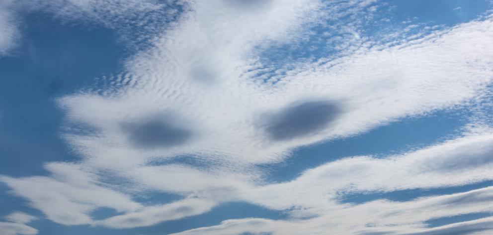 Lines of Altocumulus lenticularis in a northwesterly flow over the Wanaka area. Photo: Heather...