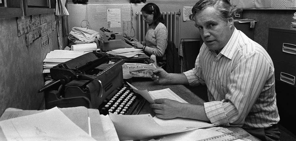 Former ODT business editor Michael Shelton working on sharetables one evening in 1980. The paper...