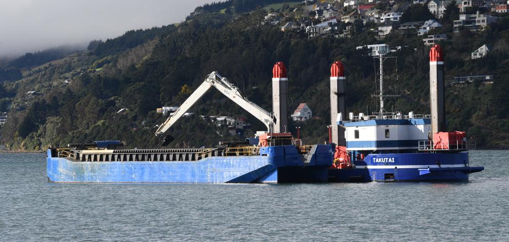 Port Otago's $8million backhoe dredge Takutai works in the upper reaches of Otago Harbour in July. Photo: Stephen Jaquiery