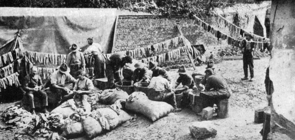 Twenty men, 45 years of age or older, wash 4000 pairs of socks daily for the troops at the front....