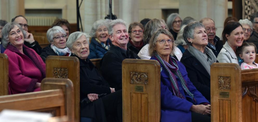 The audience laughs as poet Bill Manhire gives his performance Tell Me My Name.