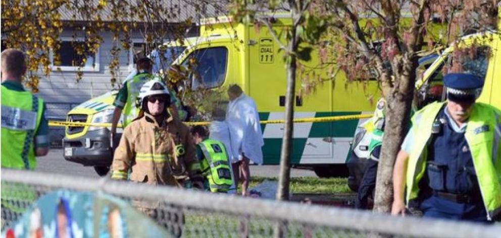 Police and ambulance staff at South End School in Carterton. Students have fallen sick after an...