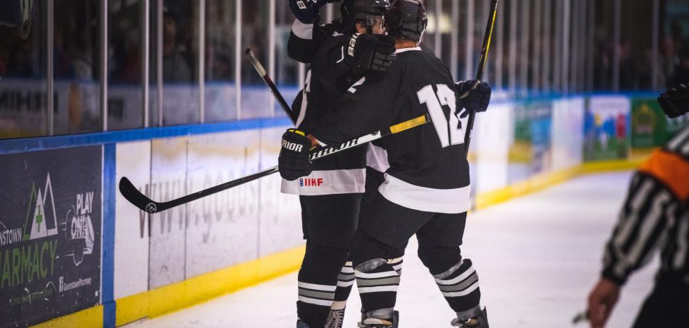 Members of the Ice Blacks celebrate their win over Australia last night secured a convincing...