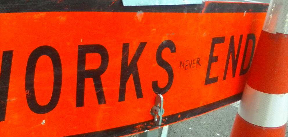 Many around Dunedin will sympathise with this telling piece of roadworks rage on a sign in Moray Pl. Photo: Peter Dowden