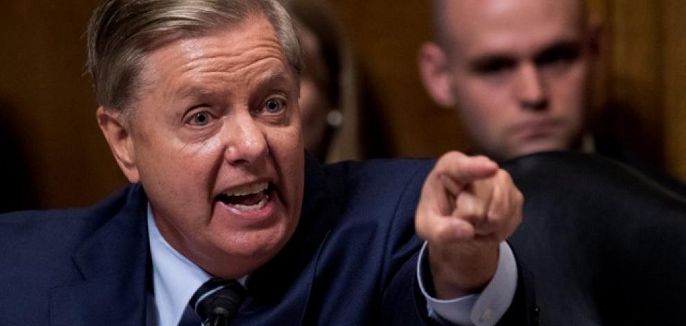 At the hearing, Republican Senator Lindsey Graham castigated Democratic senators, seeking to rally Republicans not to abandon the nominee. Photo: Reuters