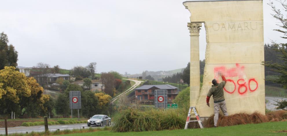 The graffiti painted onto the Oamaru entrance sign. Photo: Hamish MacLean