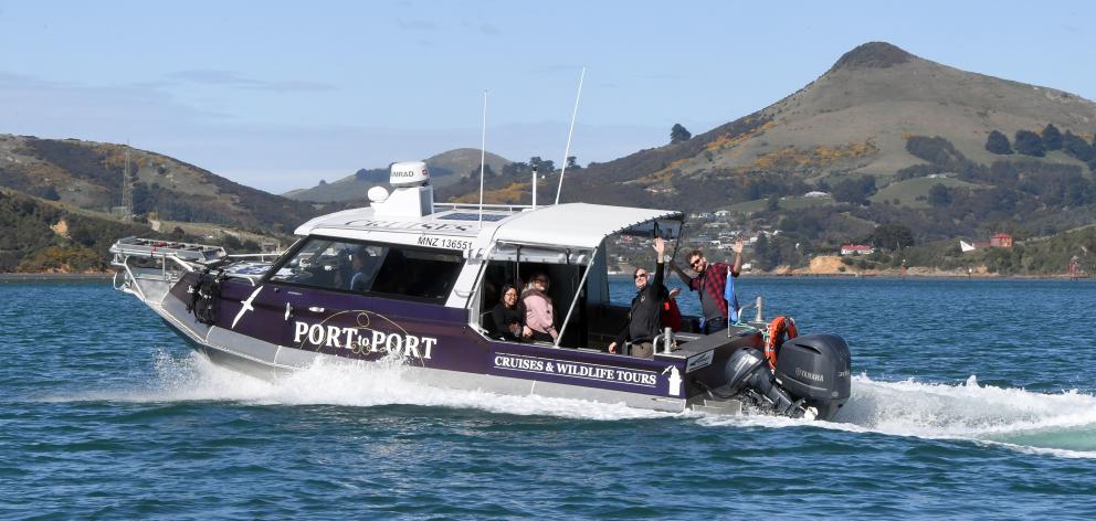 The first passenger ferry on Otago Harbour in more than 60 years takes company and Dunedin I-SITE...