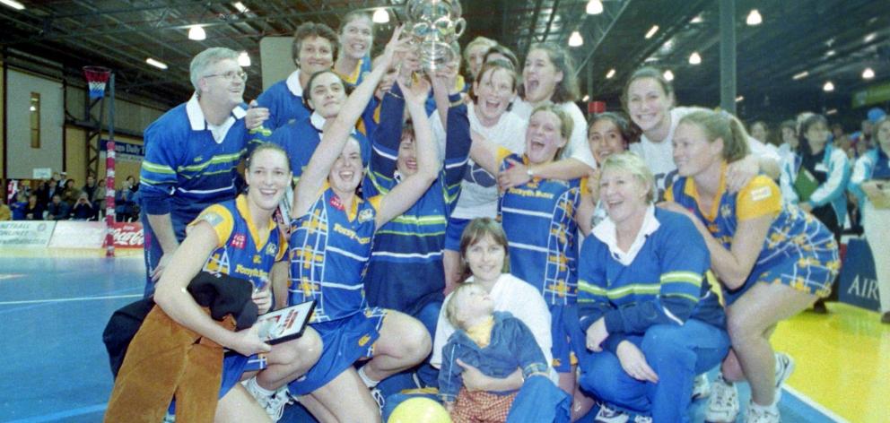 The  Otago Rebels team celebrates winning the national netball title in 1998. Photo: ODT