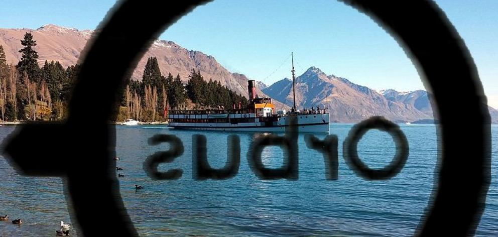 The reversed Orbus logo on Queenstown bus windows provides a whole new view for passengers of...