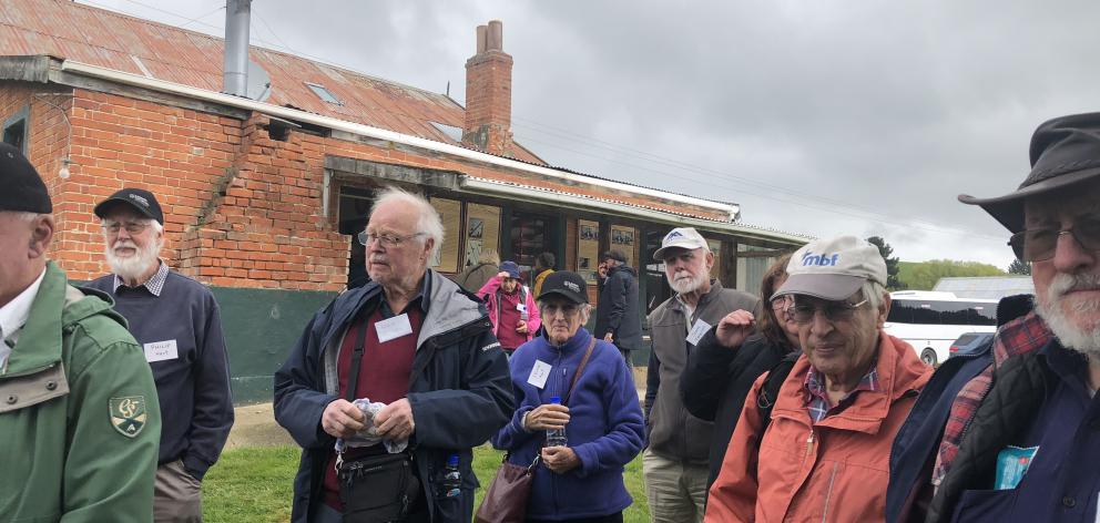 Mining enthusiasts and historians pay a visit to the Lawrence Chinese Camp yesterday as part of...