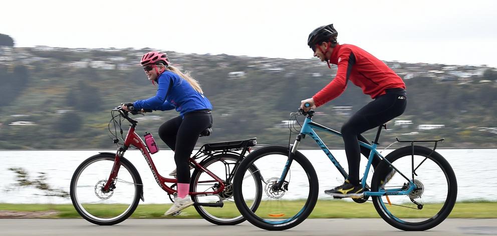 Sarah Ford (14) leads father Chris (47) along the Ravensbourne cycleway. Photo: Peter McIntosh