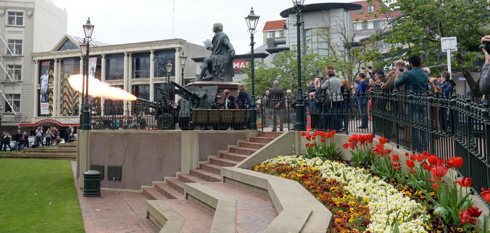 Dunedin boy Flint Watson (5) muffles the booms of field guns being fired in the Octagon yesterday...