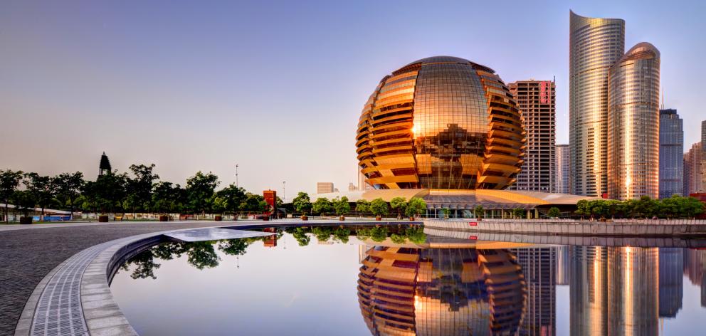 The International Conference building (left) makes up a part of the cityscape of Hangzhou, China. Photo: Getty Images