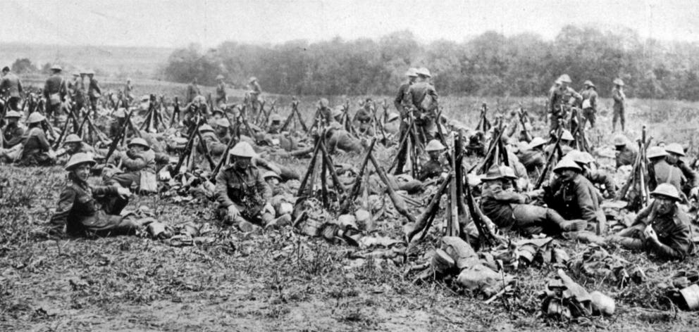 New Zealand troops who attended a horse show on the western front had their weapons close by and...