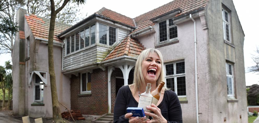 Home owner Melanie Kerr with items returned to, or found at, the Tolcarne Ave house she bought....