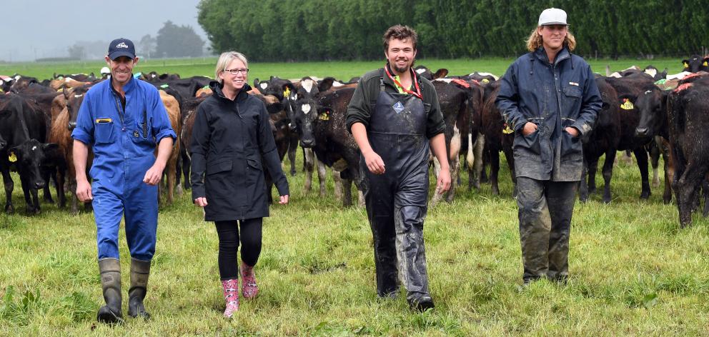 Duncan (left) and Anne-Marie Wells with employees Shae Gosney and Harm Smulders on their Outram...