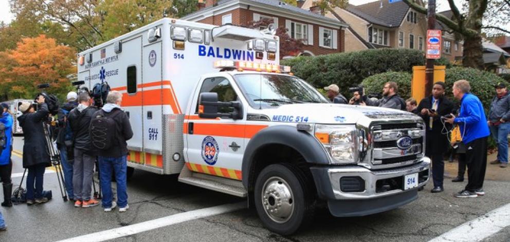 An ambulance departs the Tree of Life synagogue. Photo: Reuters