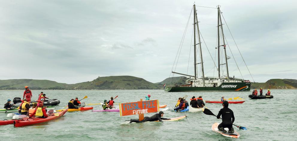 A flotilla of supporters welcome the Rainbow Warrior to Dunedin on Saturday afternoon. Chilly...