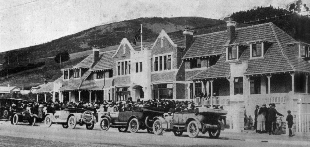 Vehicles drawn up in front of Ross Home, Normanby, North East Valley, during the opening ceremony...