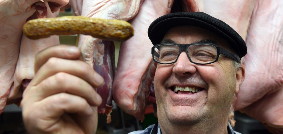 Agora butchery and deli owner Ross Hutchison displays his gold medal-winning lentil, kumara and...