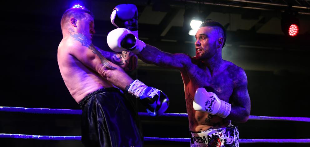 Dunedin boxer Kurt Winklemann in the ring against Waikato’s Nigel Elliott at the Edgar Centre on...