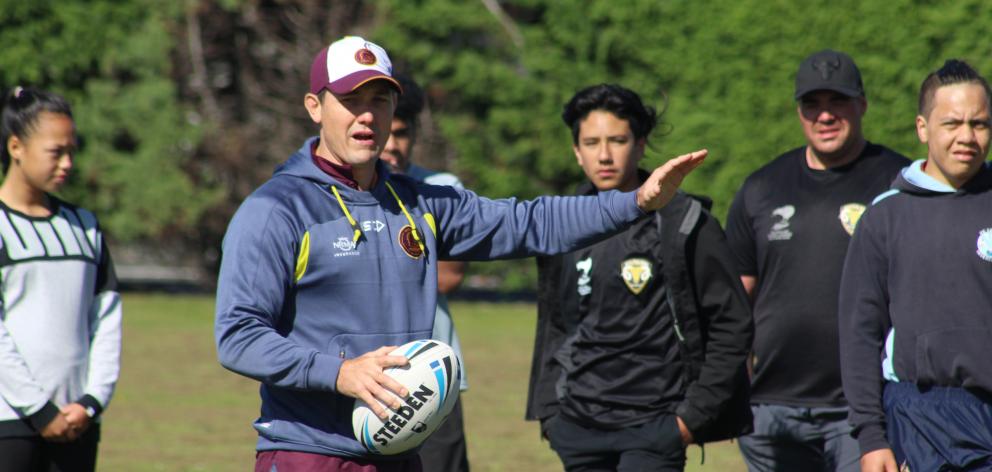 Brisbane Broncos game development manager and Broncos women’s coach Paul Dyer put a group of...
